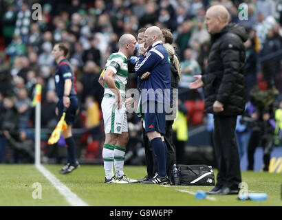 Rangers v Celtic - William Hill Scottish League Cup - Semi Final - Hampden Park. Celtic's Scott Brown gets treatment on the sideline during the William Hill Scottish Cup semi-final match at Hampden Park, Glasgow. Stock Photo