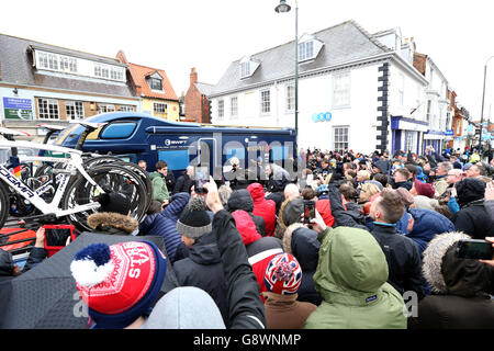 Crowds surround Sir Bradley Wiggins team motor home as he steps out to talk to the media prior to the start of during stage one of the Tour de Yorkshire. Stock Photo