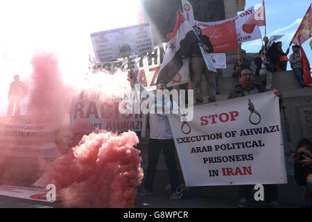 A group of Iranian political protestors from the Democratic Party of Alahwaz protest in Trafalgar Square, central London, during a May Day rally to mark the international day honouring workers.