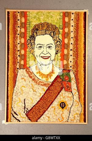 A portrait of Queen Elizabeth II which has been created by food artist Prudence Staite using ingredients from Harvester's salad bar to celebrate the monarch's up-coming 90th birthday. Stock Photo