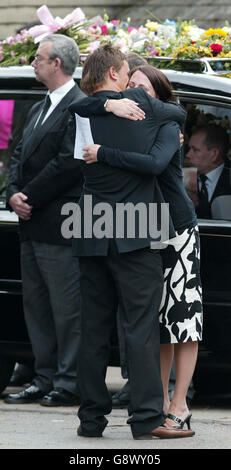 Brendan Shanahan, center-left, and other mourners leave the RCMP Depot  after the funeral service of Derek Boogaard in Regina, Saskatchewan, Canada  on Saturday, May 21, 2011. Boogaard, a professional hockey player who