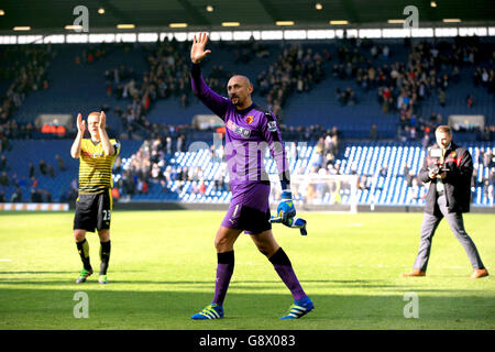 Watford goalkeeper Heurelho Gomes celebrates after the final whistle during the Barclays Premier League match at The Hawthorns, West Bromwich. Stock Photo