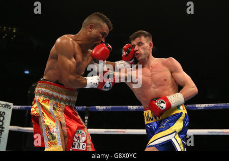 Martin Ward (right) in action against Ruddy Encarnacion during their WBC Intercontinental Super-Featherweight bout at the First Direct Arena, Leeds. Stock Photo