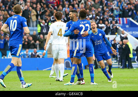 Leicester City's Marc Albrighton celebrates scoring his sides fourth goal of the match with team-mates during the Barclays Premier League match at The King Power Stadium, Leicester. Stock Photo