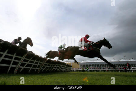 Shamiran ridden by jockey Niall Kelly (left) on the way to winning the ...