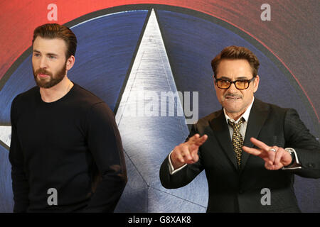 Chris Evans and Robert Downey Jr. (right) attending the Captain America Civil War Photocall, at the Corinthia Hotel, London. PRESS ASSOCIATION Photo. Picture date: Monday April 25, 2016. Photo credit should read: Daniel Leal-Olivas/PA Wire Stock Photo
