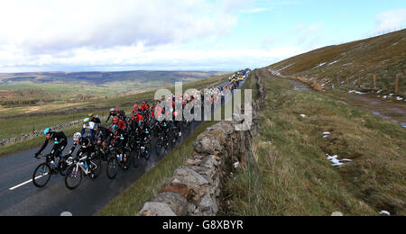 Team Sky's Xabier Zandio (left) rides alongside teammate Oeter Kennaugh at the front of the peloton after the Cote de Greenhow Hill during stage one of the Tour de Yorkshire. Stock Photo