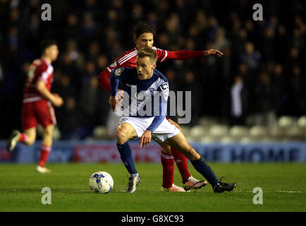 Birmingham City's Maikel Kieftenbeld (front) and Middlesbrough's Gaston Ramirez battle for the ball during the Sky Bet Championship match at St Andrew's, Birmingham. Stock Photo