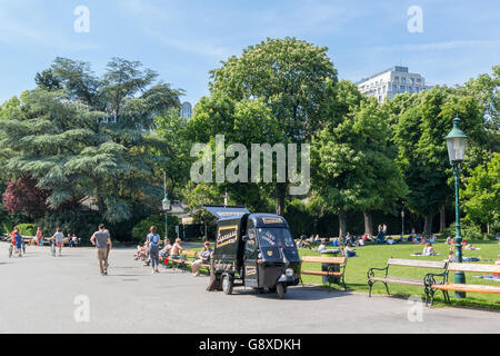 People relaxing and enjoying nice weather on a Sunday afternoon in Stadtpark, City Gardens, in Vienna, Austria Stock Photo