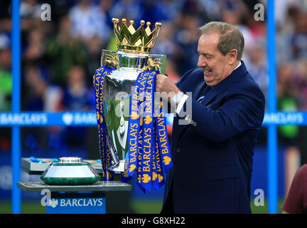 Leicester City Ambassador Alan 'The Birch' Birchenall puts the trophy on the winners podium after the Barclays Premier League match at the King Power Stadium, Leicester. Stock Photo