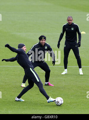 Manchester City's Sergio Aguero (centre) during a training session at City Football Academy, Manchester. Stock Photo