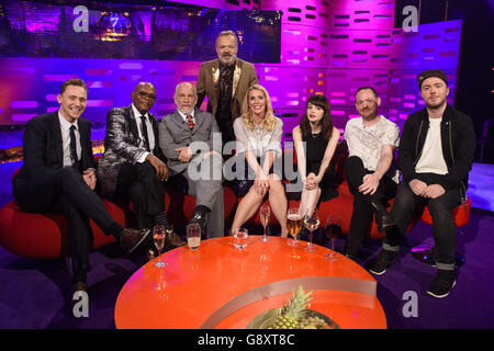 (left to right) Tom Hiddleston, Samuel L Jackson, John Malkovich, Sara Pascoe, Lauren Mayberry, Martin Doherty and Iain Cook pictured with host Graham Norton (centre back)during filming of The Graham Norton Show, at The London Studios, south London, to be aired on BBC One on Friday evening. Stock Photo