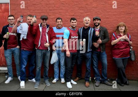 West Ham United fans outside Upton Park before the Barclays Premier League match at Upton Park, London. Stock Photo