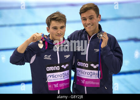 Great Britain's Tom Daley and Daniel Goodfellow celebrate with their silver medals after competing in the Men's Diving 10m Synchronised Platform Final during day four of the European Aquatics Championships at the London Aquatics Centre in Stratford. Stock Photo
