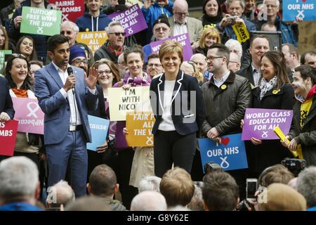 Humza Yousaf, SNP candidate for Glasgow Pollok, addresses an SNP campaign event alongside First Minister and SNP leader Nicola Sturgeon on Buchanan Street in Glasgow on the eve of the Scottish Parliament election. Stock Photo