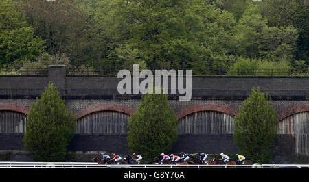 The field pass the viaduct in the Sustainable Group (UK) Ltd Handicap during Boodles City Day of the Boodles May Festival at Chester Racecourse. Stock Photo