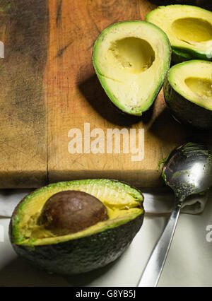 Pitting avocados Stock Photo