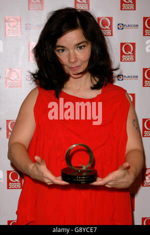 Singer Bjork displays her Q Inspiration Award during the annual Q Awards 2005, the music magazine's annual awards ceremony, at the Grosvenor House Hotel, central London, Monday 10 October 2005. See PA story SHOWBIZ Q. PRESS ASSOCIATION Photo. Photo credit should read: Ian West/PA Stock Photo