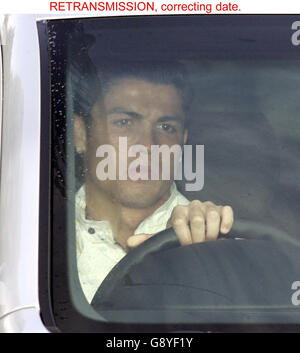 Manchester United footballer Cristiano Ronaldo arrives Thursday October 20, 2005, at the club's Carrington training complex. The 20-year-old Portuguese international winger was released on police bail Wednesday night after being questioned for several hours over allegations that he raped a woman in a London hotel. Ronaldo went voluntarily to a police station in Manchester with his lawyer to attend an appointment with detectives and has told officers he is innocent. See PA story POLICE Footballer. PRESS ASSOCIATION Photo. Photo credit should read: Phil Noble / PA. Stock Photo