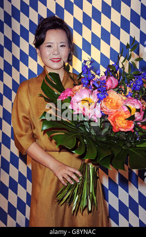 Munich, Germany. 30th June, 2016. Chinese singer Lao Luo poses during a press conference on the German-Chinese film ' Love Of Alps' in Munich, Germany, 30 June 2016. The film. which was mostly shot in Bavaria, is shown at the Munich International Film Festival. Photo: Ursula Dueren/dpa/Alamy Live News Stock Photo