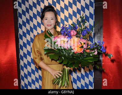 Munich, Germany. 30th June, 2016. Chinese singer Lao Luo poses during a press conference on the German-Chinese film ' Love Of Alps' in Munich, Germany, 30 June 2016. The film. which was mostly shot in Bavaria, is shown at the Munich International Film Festival. Photo: Ursula Dueren/dpa/Alamy Live News Stock Photo