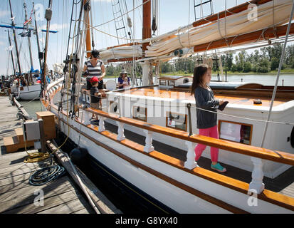 Vancouver, Canada. 30th June, 2016. People visit a tall ship during the 6th 'Ships to Shore' festival at Steveston village, Richmond, Canada, on June 30, 2016. The 3-day 'Ships to Shore' festival kicked off on Thursday and attracted more than 15 vessels from Canada and the United States. Vessels from century-old tall ships to modern Canadian Navy patrol vessels dock along the Steveston waterfront, and offer free boarding to the public to display Richmond's maritime past and present. © Liang Sen/Xinhua/Alamy Live News Stock Photo