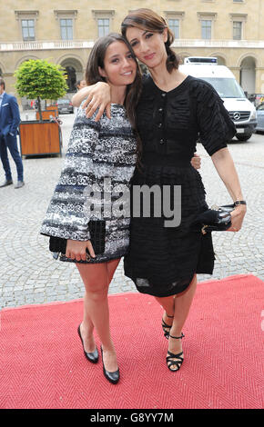 Munich, Germany. 30th June, 2016. Turkish director Deniz Gamze Ergueven (R) and Turkish actress Elit Iscan arrive for the awarding ceremony of the Peace Prize of the German Movie 'Die Bruecke'(The Bridge) within the Munich International Film Festival in Munich, Germany, 30 June 2016. Photo: URSULA DUEREN/dpa/Alamy Live News Stock Photo