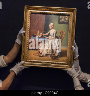 London, UK.  1 July 2016. Technicians prepare to hang 'A Dutch Girl at Breakfast' by Jean-Etienne Liotard (est. GBP 4-6 million), at the preview of Sotheby's London Old Masters evening sale which takes place 6 July.  Credit:  Stephen Chung / Alamy Live News Stock Photo