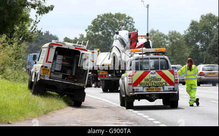 Guildford, Surrey, UK. 1st July, 2016.  A World War Two spitfire plane came off a trailer on the A3 on Friday morning. The trailer carrying a spitfire overturned on the southbound carriageway near Burntcommon. The incident happened between the B2215 London Road and the Clay Lane junction near Burpham. One lane is currently blocked and there is slow traffic southbound towards Guildford. Police and recovery services are on the scene. However, he describes the traffic as ‘absolutely chaotic’, with queues back to the M25 at junction 10 (Wisley). Credit:  uknip/Alamy Live News