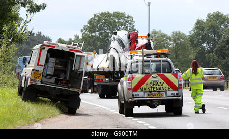 Guildford, Surrey, UK. 1st July, 2016.  A World War Two spitfire plane came off a trailer on the A3 on Friday morning. The trailer carrying a spitfire overturned on the southbound carriageway near Burntcommon. The incident happened between the B2215 London Road and the Clay Lane junction near Burpham. One lane is currently blocked and there is slow traffic southbound towards Guildford. Police and recovery services are on the scene. However, he describes the traffic as ‘absolutely chaotic’, with queues back to the M25 at junction 10 (Wisley). Credit:  uknip/Ģ����ý Live News Stock Photo