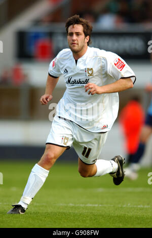 Milton Keynes Dons' Gary Smith and Oldham Athletic's Neil Kilkenny ...