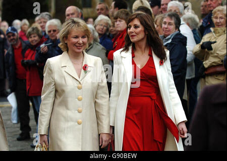 Television presenter Carol Vorderman (rt) and actress Kathryn Apanowicz (Whiteley's partner) arrive at York Minster, for the memorial service to Countdown presenter Richard Whiteley. Stock Photo