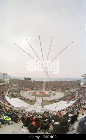 Winter Olympics - Nagano 1998 - Opening Ceremony. Jet planes fly over the Minami Nagano Sports Park, as the Opening ceremony comes to an end Stock Photo