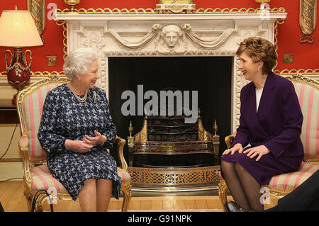 Britain's Queen Elizabeth II (left) talks with Irish President Mary McAleese at Hillsborough Castle, Belfast, Thursday December 8, 2005. It is the Queen's first visit to Northern Ireland since February 2003. See PA story ROYAL Ulster. PRESS ASSOCIATION Photo. Photo credit should read: Niall Carson/Pool/PA Stock Photo