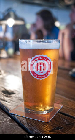 Camden Town Brewery pint of pale ale on a bar in Camden Town North London Stock Photo