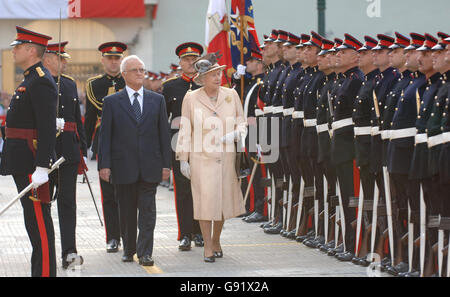 Queen Elizabeth II inspects Guard of Honour formed by the Armed Forces of Malta accompanied by Maltese President, Fenech Adami, in St Georges Square, Valetta on Wednesday November 23rd 2005, after arriving in the Capital for the four day Royal visit See PA Story ROYAL. Malta. PRESS ASSOCIATION PHOTO Photo credit should read. Fiona Hanson/PA Stock Photo