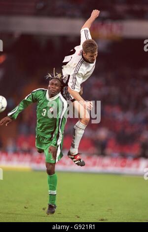 Soccer - Friendly - Germany v Nigeria. Germany's Oliver Biehoff (R) and Nigeria's Taribo West (L) battle for the ball Stock Photo