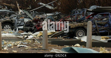 Cars destroyed in the car park at Northgate on the Maylands industrial park, Hemel Hempsted after it was devestated by the Buncefield Oil Terminal blast. Wednesday December 14 2005. Business owners on the industrial park were today returning to their premesses to assess the aftermath left by the Oil terminal explosion. See PA Story BLAST Explosion. PRESS ASSOCIATION PHOTO Photo credit should read Chris Radburn/Pool/PA Stock Photo