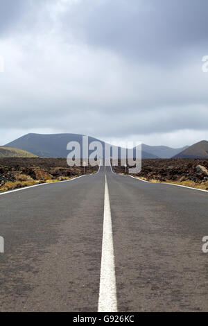 LZ67 road from Mancha Blanca to Timanfaya National Park, Lanzarote Stock Photo