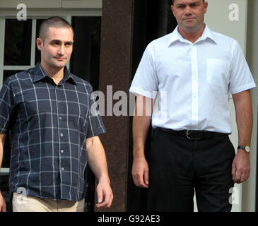 Brothers of missing British backpacker Peter Falconio, Paul (left) and Nick leave the Northern Territory Supreme Court in Darwin, Australia, Monday December 11, 2005. The judge in the Peter Falconio murder trial today told jurors to disregard the British backpacker's girlfriend Joanne Lees' belief that her attacker was caught on security footage near the scene of the attack. See PA story COURTS Falconio. PRESS ASSOCIATION Photo. Photo credit should read: Wesley Johnson/PA. Stock Photo