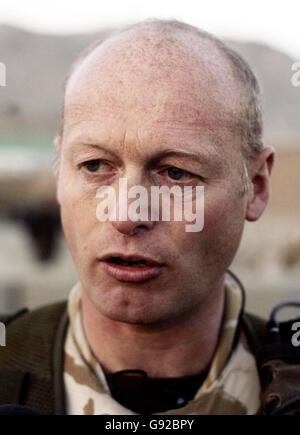 Sergeant Major Richard Sayer in the desert outside the Afghan capital Kabul, Wednesday December 14, 2005. British soldiers are training a new army to take on al Qaida and the Taliban in the barren desert outside Kabul. As the latest recruits to the six-week British battle course for junior NCOs line up they shout 'Live, Live Afghanistan' and raise their Russian AK-47s to the sky. In the coming months those who graduate will be sent, as part of the Afghan National Army, to fight in the south and east of the country and it is the job of Sergeant Major Richard Sayer to make sure they win. The Stock Photo