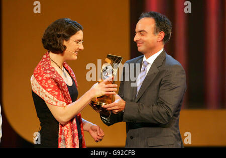 Women's World Player of the year Birgit Prinz receives her winners trophy from Heinze Miller Stock Photo