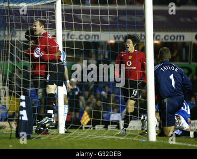 Manchester United's Louis Saha is congratulated on his goal by Ji-Sung ...