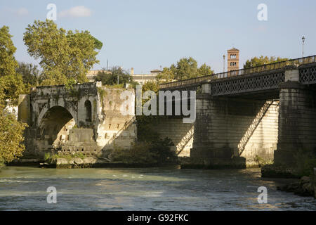 Remains of the 2nd century Roman stone bridge Ponte Rotto or Pons Aemilius, & Ponte Palatino over the River Tiber, Rome, Italy. Stock Photo