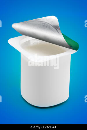 Blank Yogurt Open Cup on Blue Stock Photo