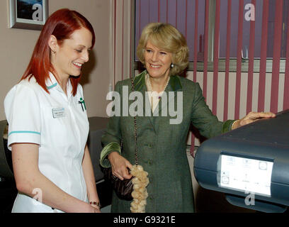 The Duchess of Cornwall, who is president of the National Osteoporosis Society, is shown a new bone density scanner by technician Emma Longrigg during a visit to Northampton General Hospistal, Friday January 6, 2006. While the Duchess tours the hospital, the Prince of Wales is due to meet residents, planners and councillors on a visit to the environmentally friendly Upton village development on the outskirts of Northampton. See PA story ROYAL Charles. PRESS ASSOCIATION photo. Photo credit should read: Rui Vieira/PA. Stock Photo