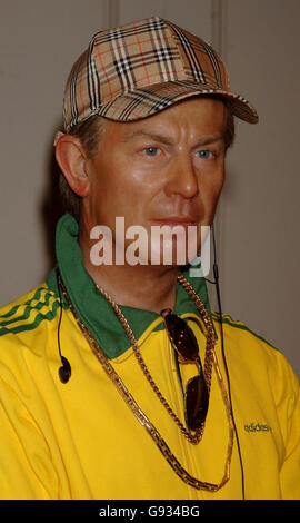 Chav in burberry cap Stock Photo - Alamy