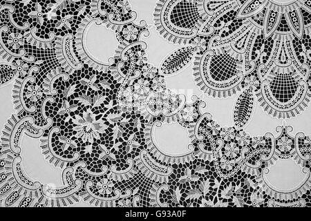 Detail of an old hand-embroidered lace table cloth Stock Photo