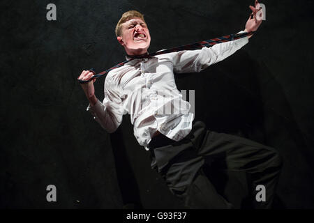 A young male student at Aberystwyth University theatre studies department performing a self-devised one-man solo intensive physical theatre production project as part of his final year degree assessment  Wales UK Stock Photo