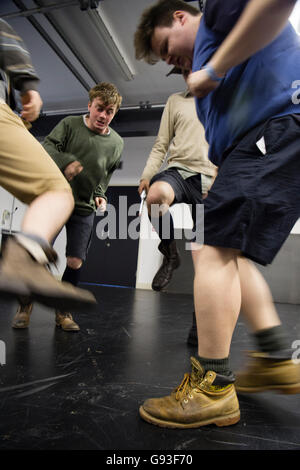 Performing arts education: Aberystwyth University undergraduate student theatre studies students  rehearsing the 'killing a squirell' scene in  a production of the classic television drama ; 'Blue Remembered Hills' by Dennis Potter. UK Stock Photo